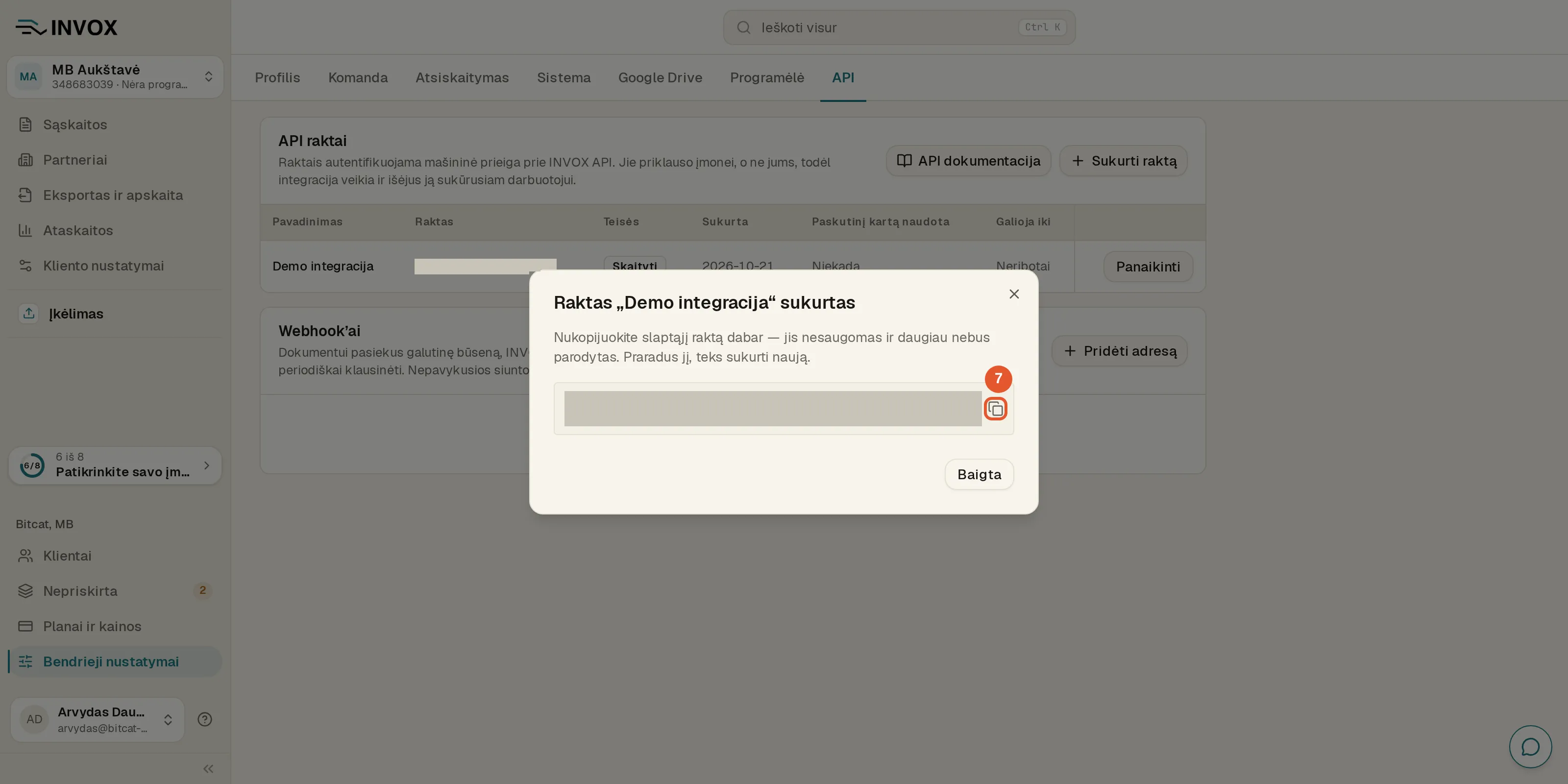 Langas „Raktas „Demo integracija“ sukurtas“: slaptasis raktas uždengtas, šalia jo pažymėta kopijavimo piktograma, apačioje mygtukas „Baigta“.
